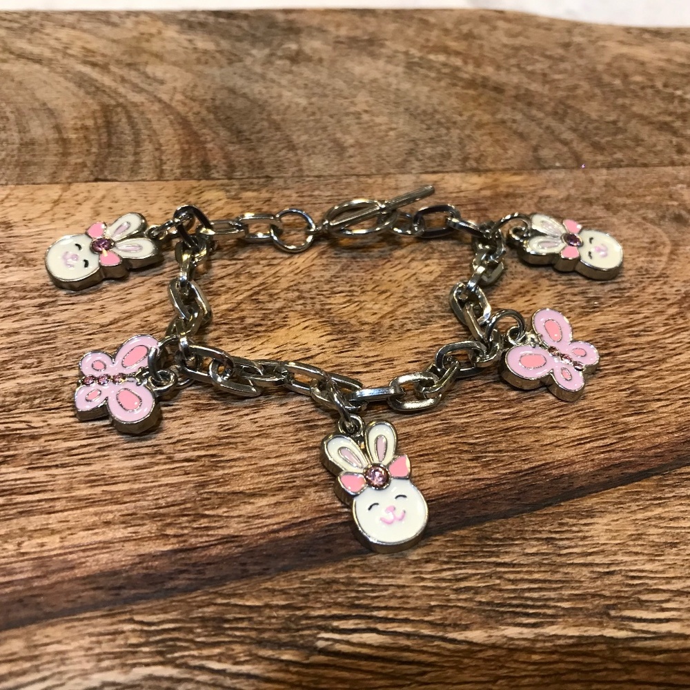 Silver tone bunny & butterfly charm bracelet with toggle clasp